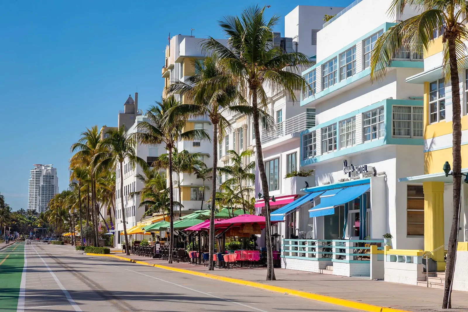 Pastel Art Deco hotels and palm trees along Ocean Drive in South Beach, Miami Beach