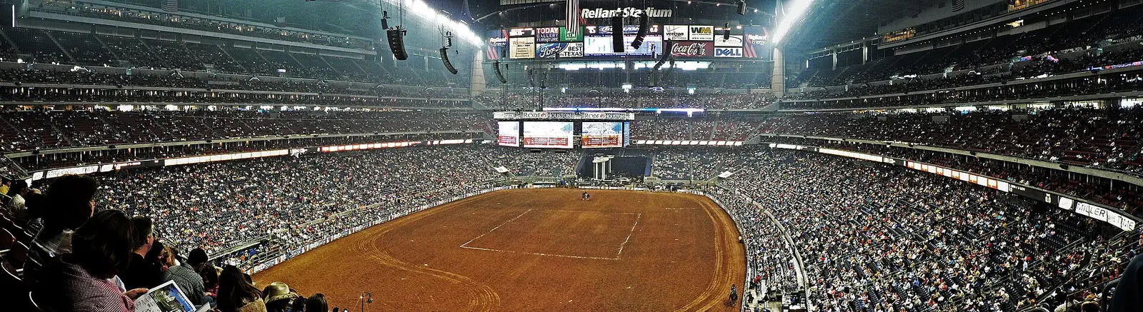 Dirt arena and packed stands at Reliant Stadium during the Houston rodeo