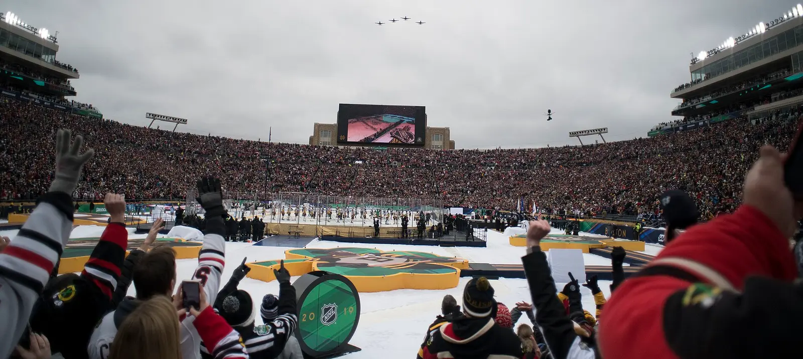 A-10 jets fly over the packed stadium during the pre-game ceremonies of the 2019 NHL Winter Classic