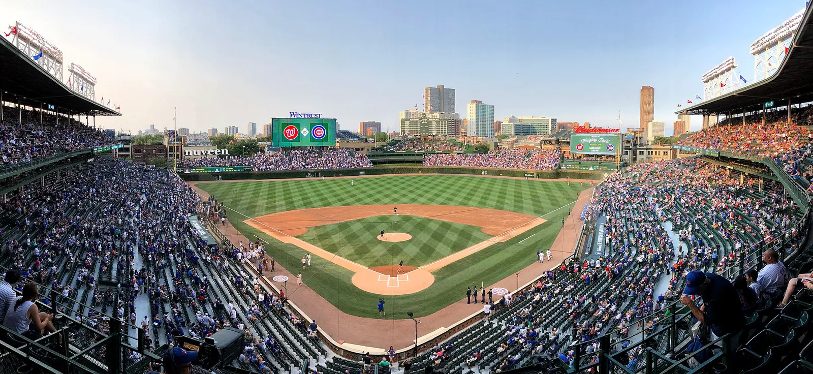 Wrigley Field in Chicago seen from the upper deck, with the skyline beyond the outfield
